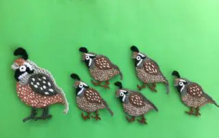 Finished crochet quail group landscape