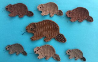 Finished crochet beaver group landscape