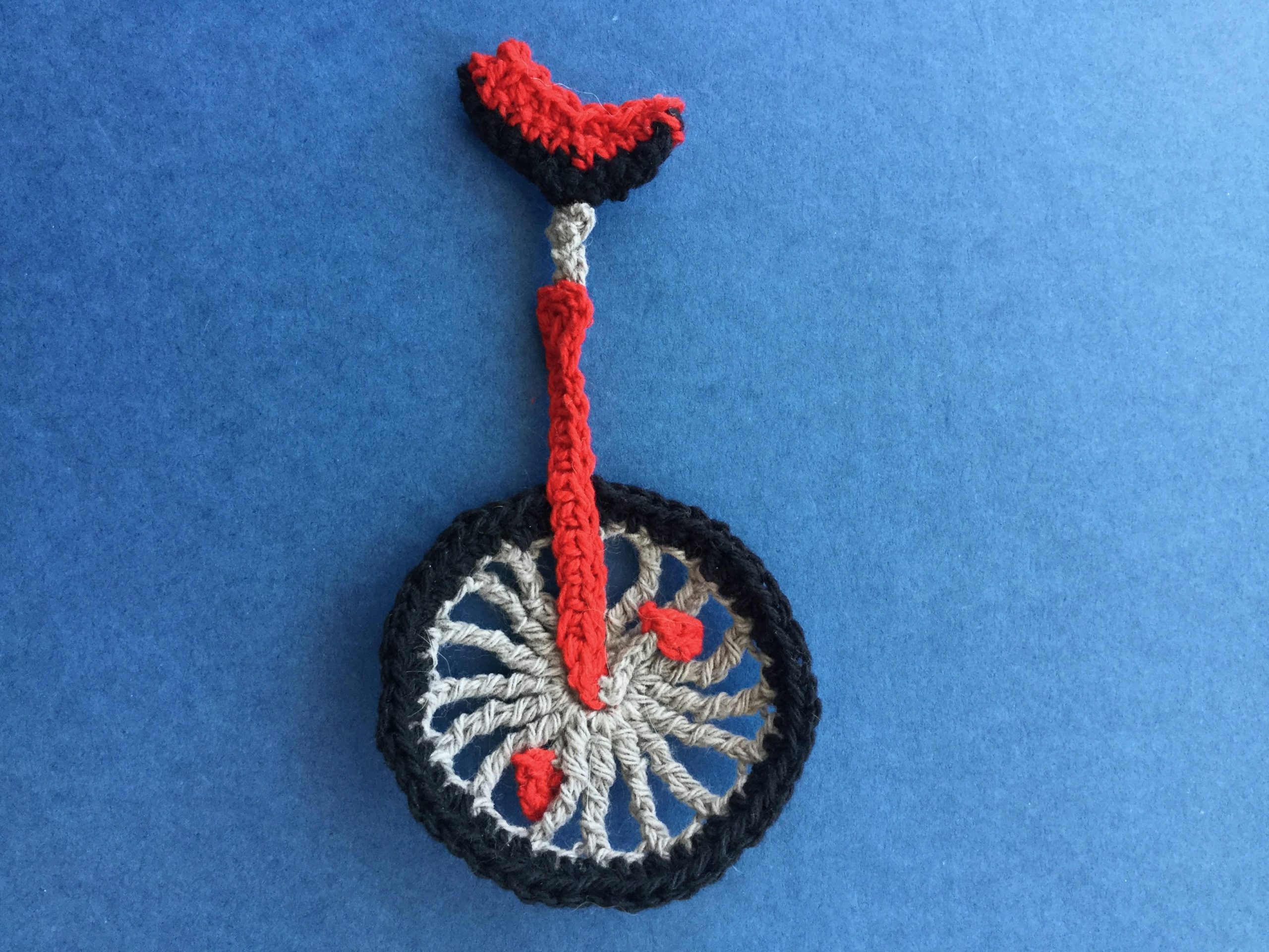 Finished crochet unicycle 4 ply landscape