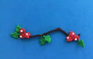 Finished crochet branch 2 ply branch with red flowers landscape