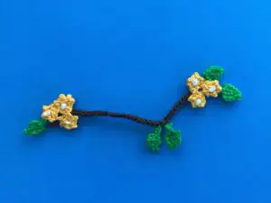 Finished crochet branch tutorial 2 ply branch with yellow flowers landscape