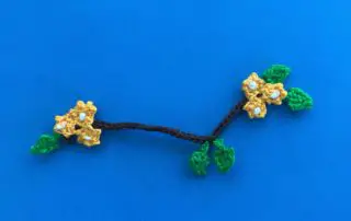 Finished crochet branch 2 ply branch with yellow flowers landscape