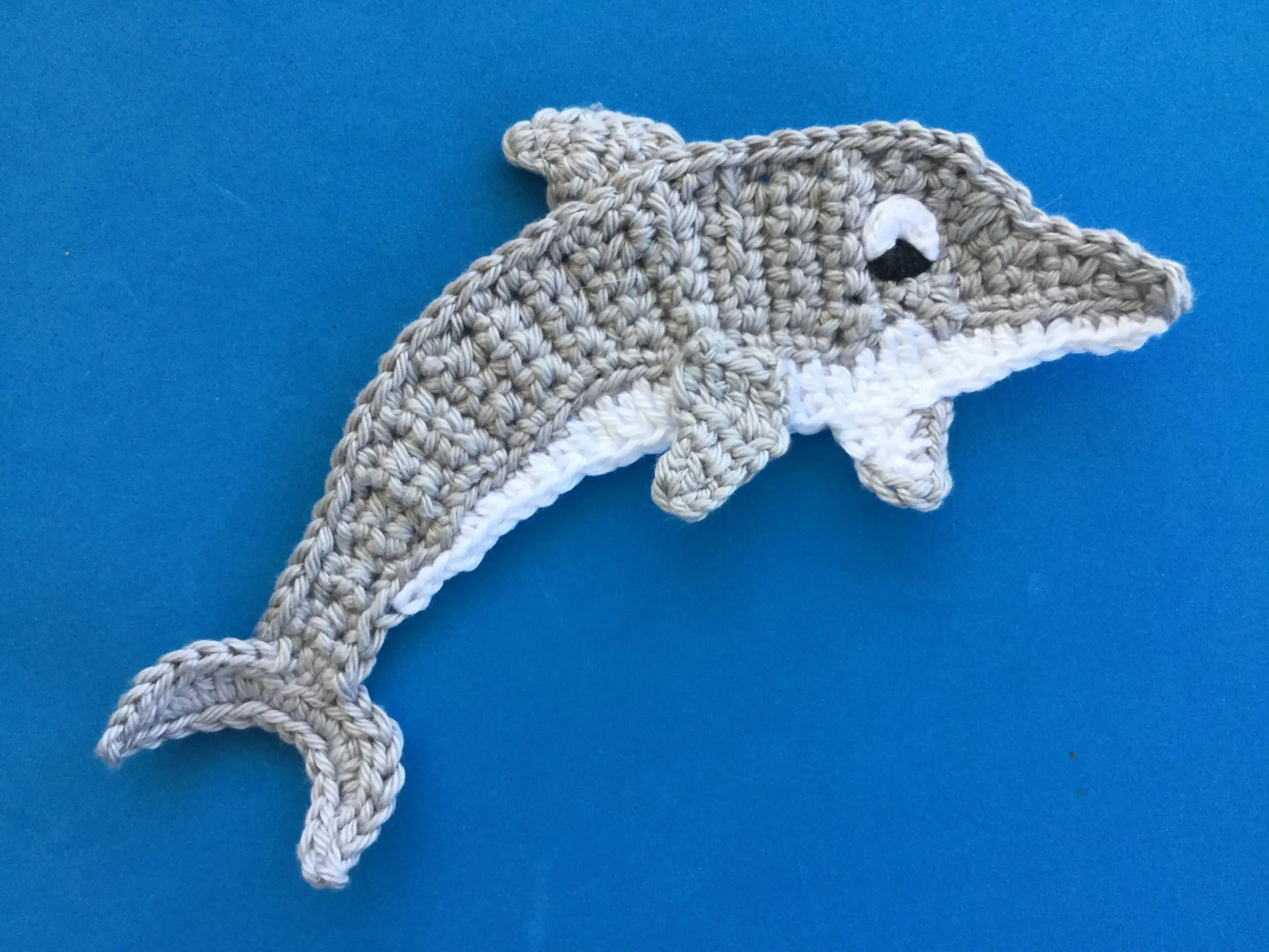 Finished crochet dolphin 4 ply landscape