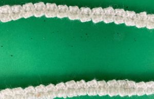 Crochet flower scarf braid close up