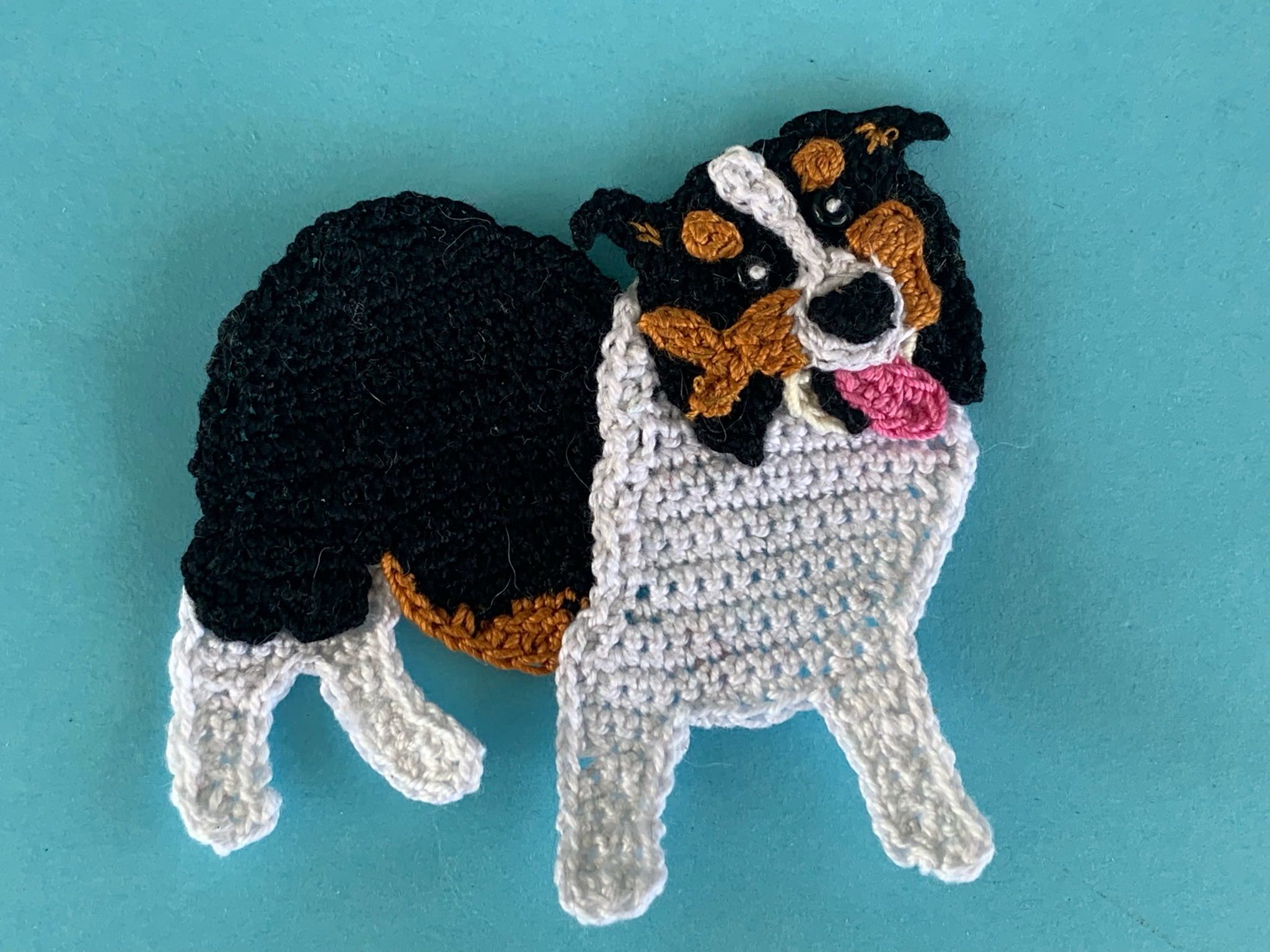 Finished crochet tri colored border collie 2 ply landscape