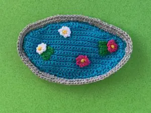Finished crochet pond 2 ply easy edge light blue landscape