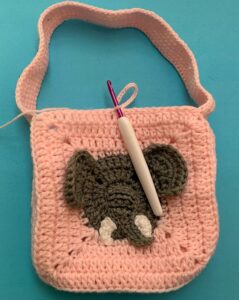 Crochet elephant bag joining for button
