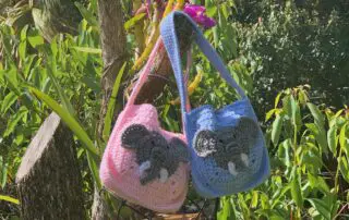 Finished crochet elephant bag outside landscape