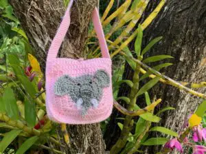 Finished crochet elephant bag pattern outside landscape 3