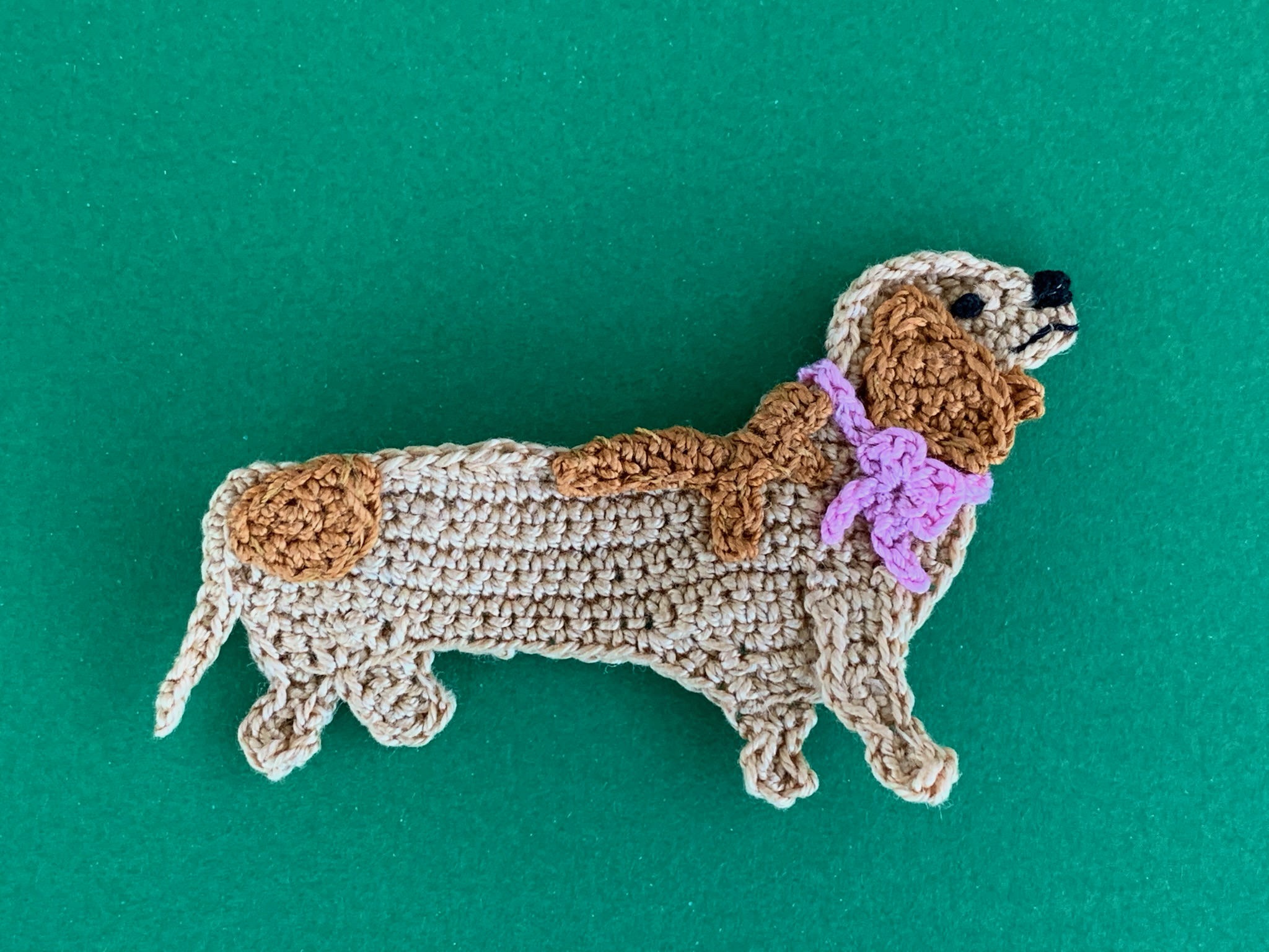 Finished crochet sausage dog 2 ply landscape