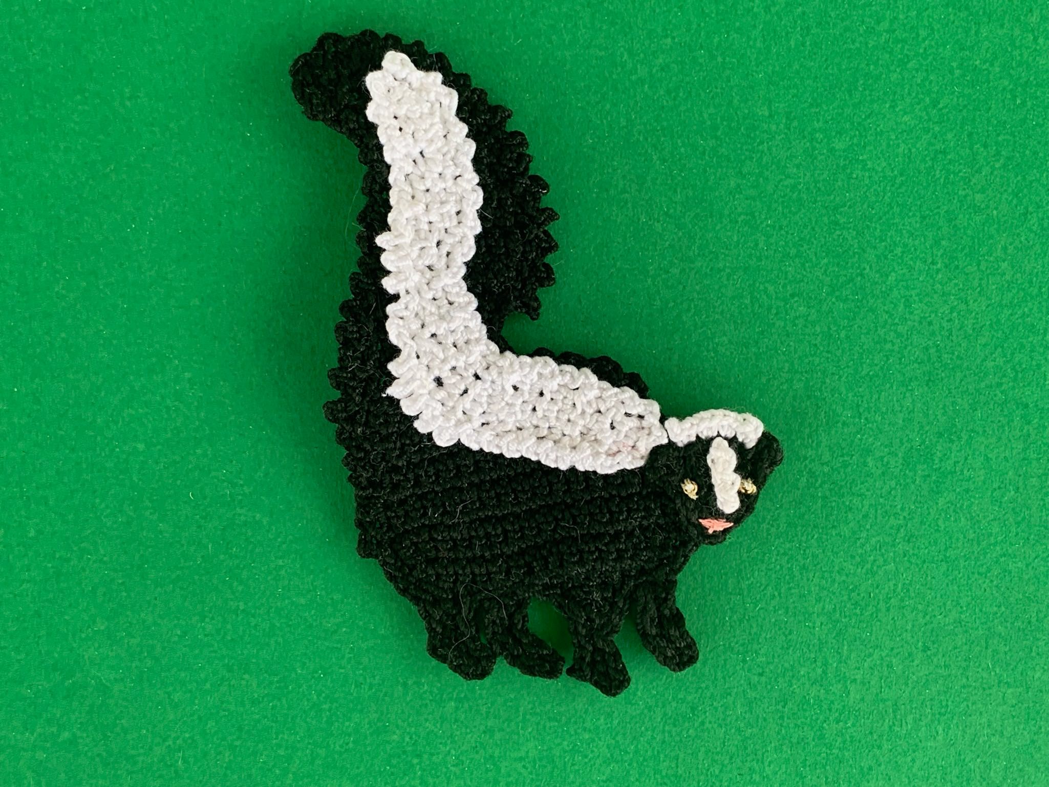 Finished crochet skunk 2 ply landscape