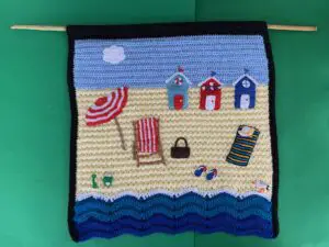 Finished crochet wall hanging pattern with bamboo landscape