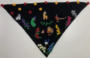 Crochet shawl appliqués placed on