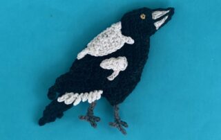 Finished crochet magpie 4 ply landscape