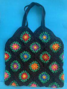 Finished crochet granny square shopping bag portrait