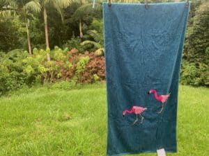 Finished crochet flamingo towel landscape 3