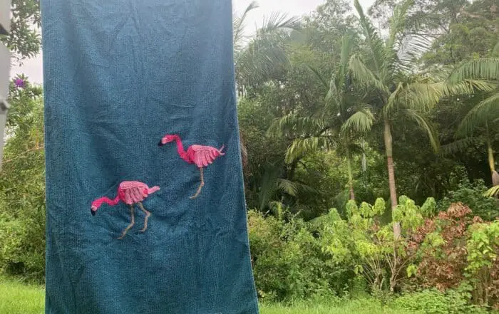 Finished crochet flamingo towel landscape