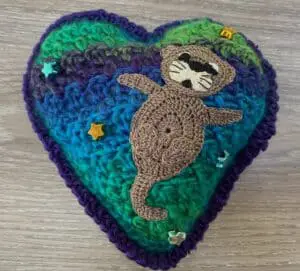 Crochet heart otter