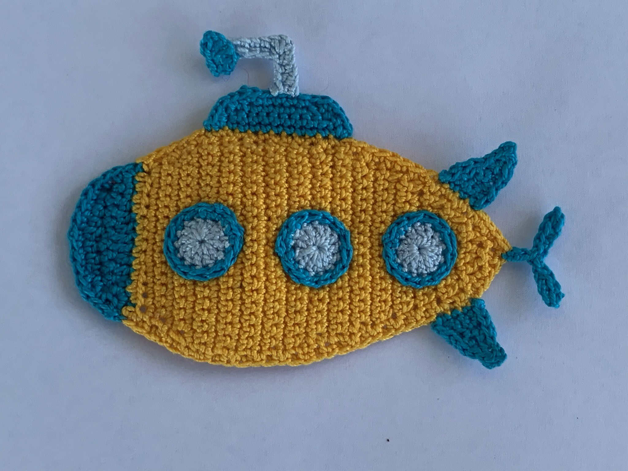 Finished crochet submarine 2 ply landscape white background