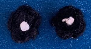 Crochet penguin granny square eyes with dots