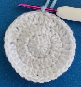 Crochet penguin granny square joining for row 4