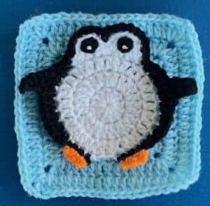 Crochet penguin granny square with eyes