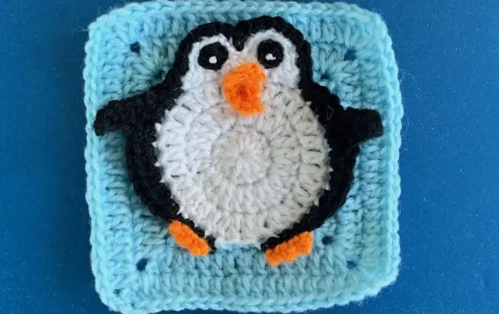 Finished crochet penguin granny square landscape