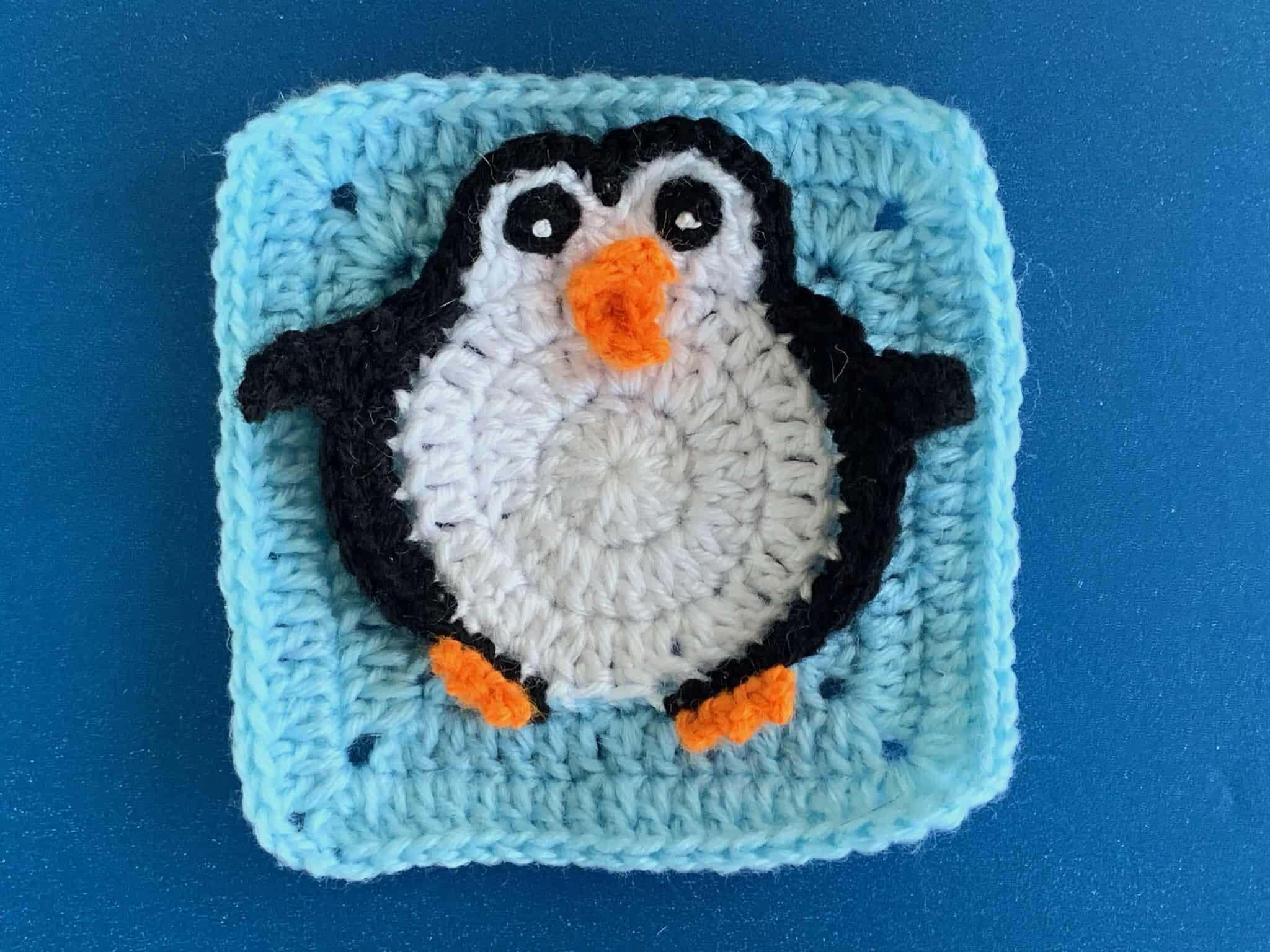 Finished crochet penguin granny square landscape
