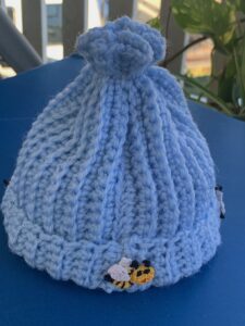Finished crochet beanie bee portrait