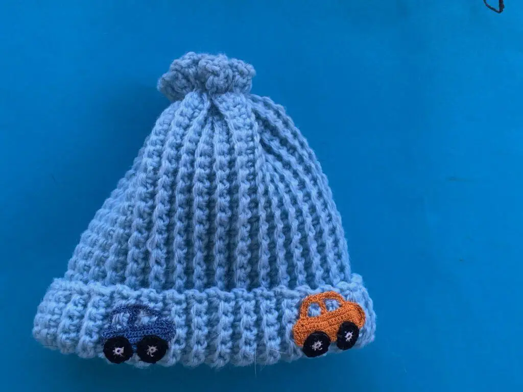 Finished crochet beanie car landscape