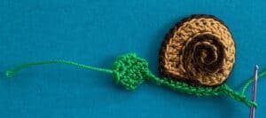 Crochet snail 2 ply head with body row 1