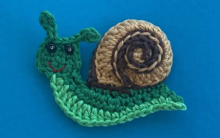 Finished crochet snail 4 ply landscape
