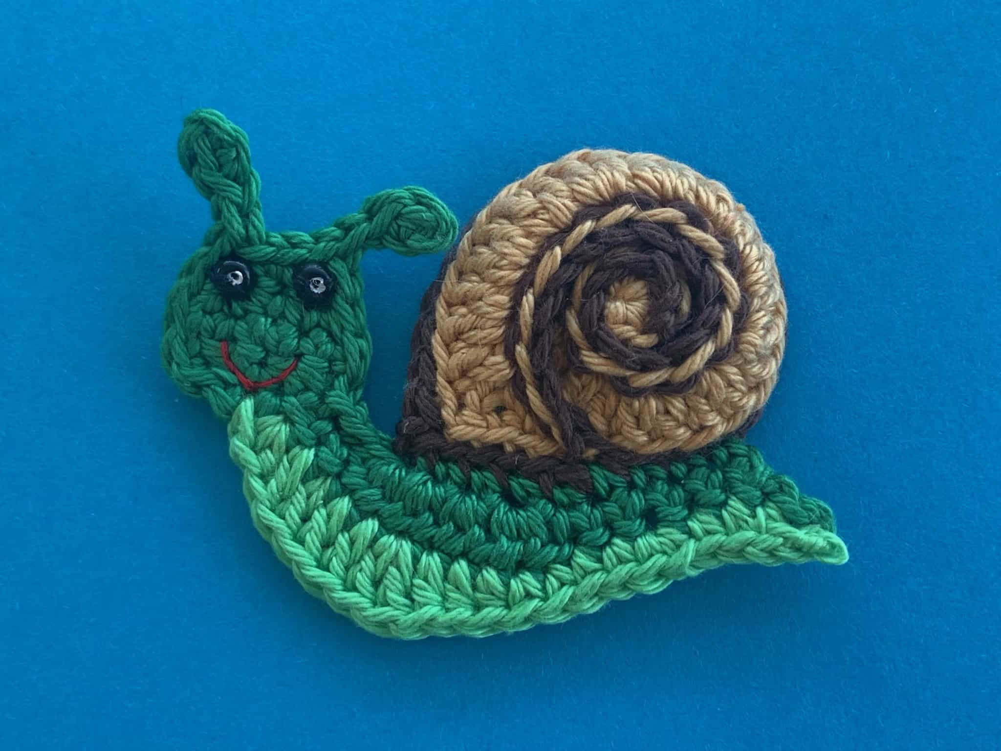 Finished crochet snail 4 ply landscape